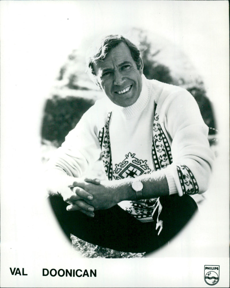 Music artist Val Doonican wearing a mask. - Vintage Photograph