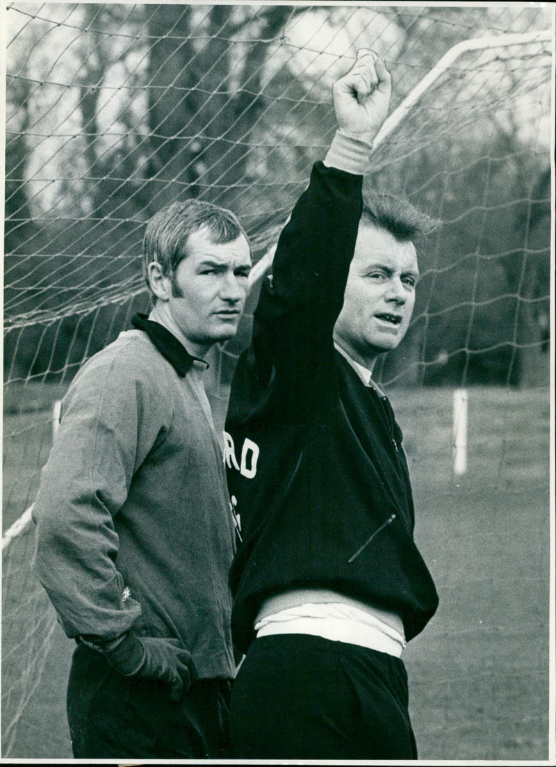 Watford manager Ken Furphy and goalkeeper Mike Walker discuss tactics during training session. - Vintage Photograph