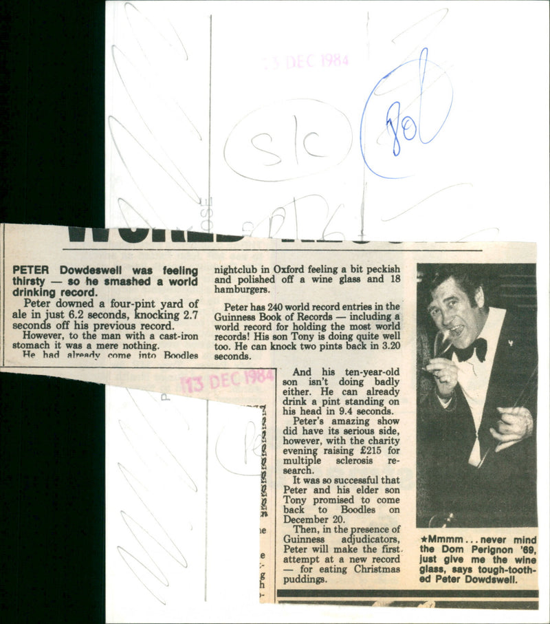 Peter Dowdeswell breaks a world drinking record with a four-pint yard of ale in just 6.2 seconds. - Vintage Photograph
