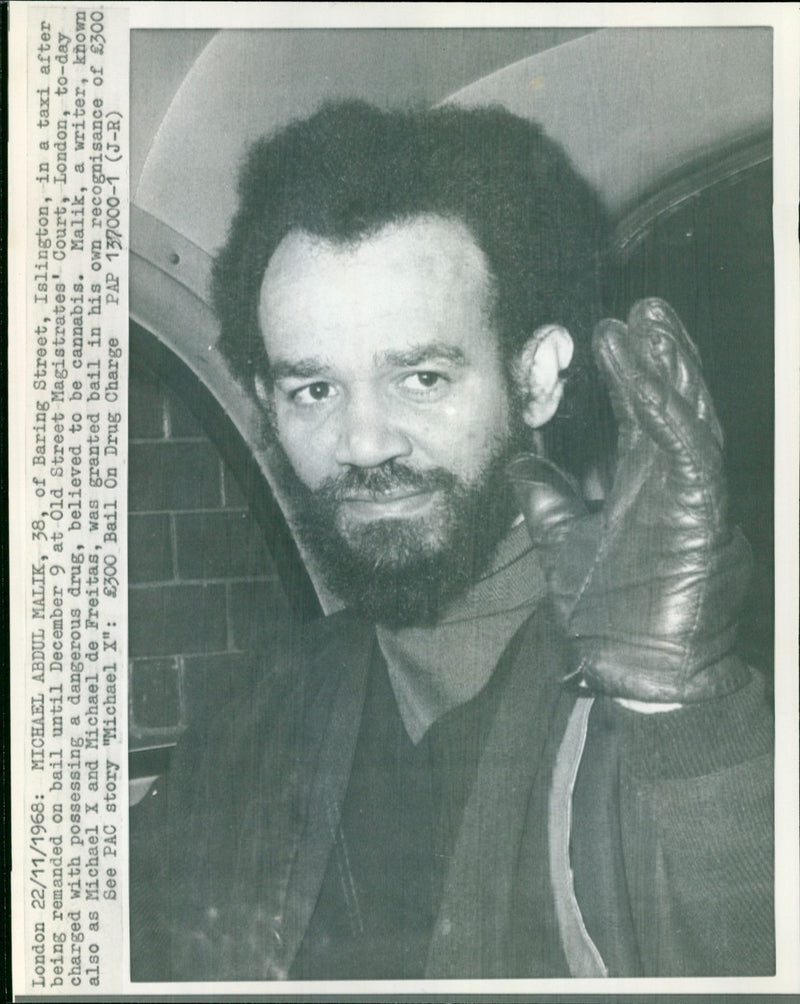 Michael Abdul Malik leaves Old Street Magistrates' Court after being granted bail on a drug charge. - Vintage Photograph