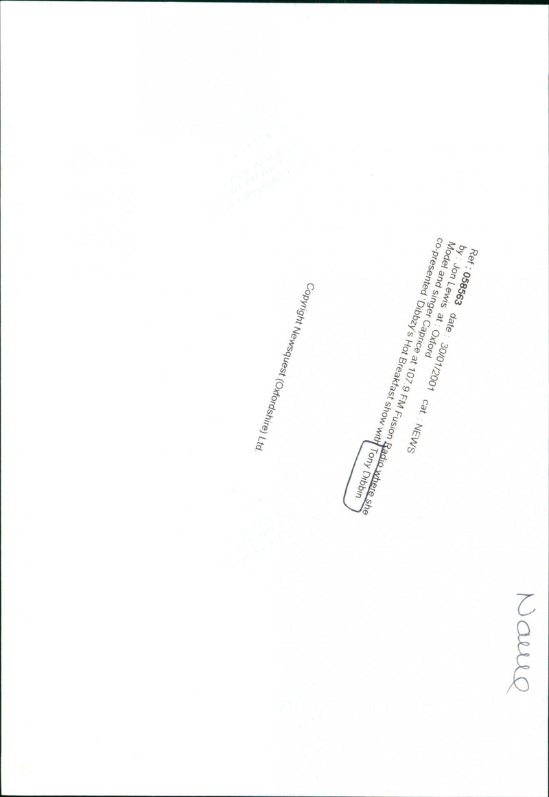 Model and singer Caprice co-presenting a radio show. - Vintage Photograph