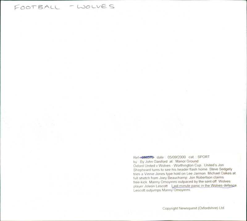 Last minute panic in the wolves defence Lescott outjumps Manny Omoyinmi - Vintage Photograph