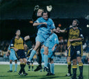 Last minute panic in the wolves defence Lescott outjumps Manny Omoyinmi - Vintage Photograph