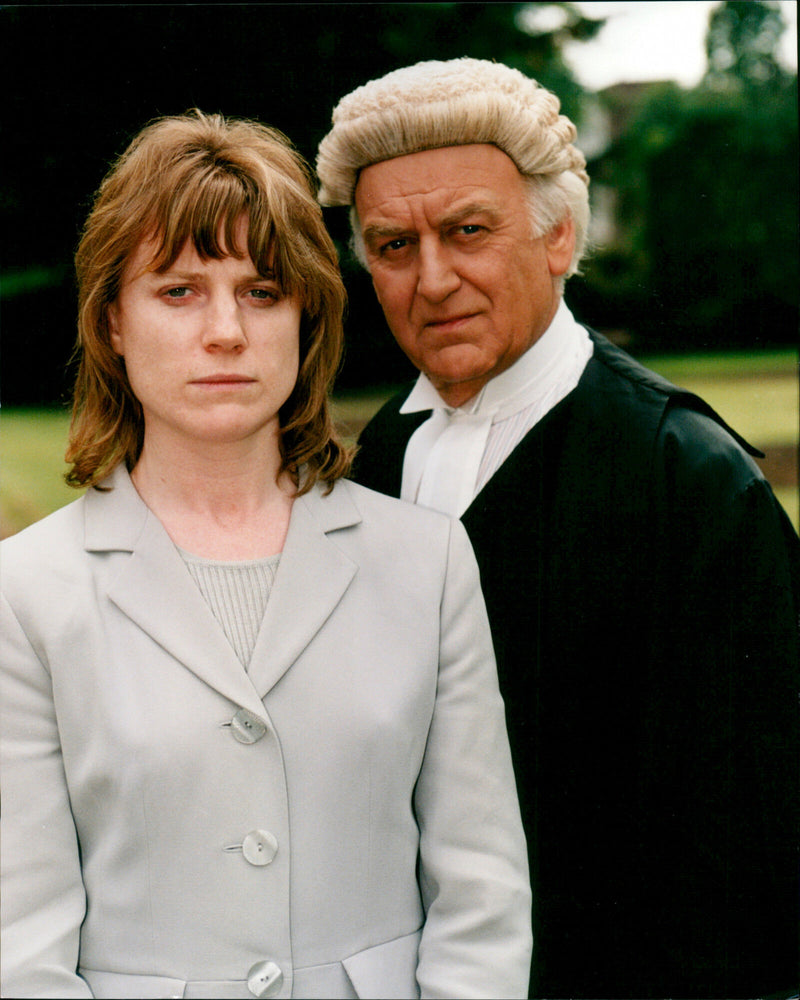 John Thaw as James Kavanagh Q.C. and Lynda Steadman as Elaine Sturmer in a scene from the ITV Network series "Kavanagh Q.C." - Vintage Photograph