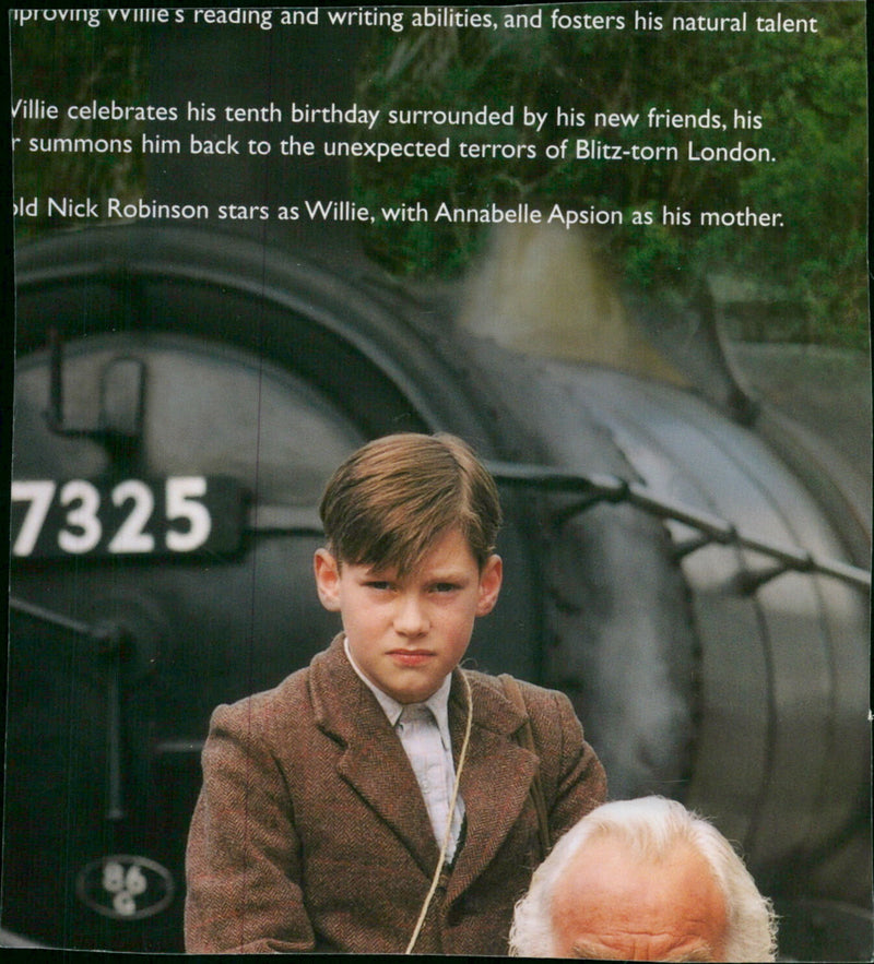 Nick Robinson and Annabelle Apsion celebrate Villie's tenth birthday in a scene from the movie "Villie". - Vintage Photograph