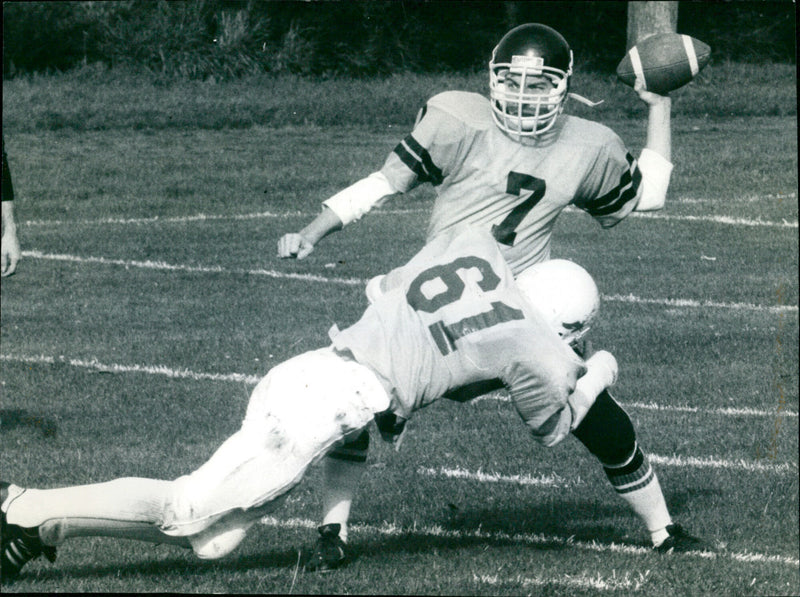 American Football match between the Los Angeles Rams and St. Louis Cardinals. - Vintage Photograph