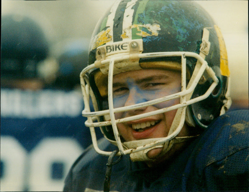 American football player Vike Verah Bajer celebrates a touchdown. - Vintage Photograph