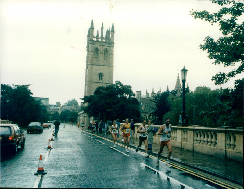 Runners competing in Oxford Half Marathon on Magdalen Bridge in the first lap - Vintage Photograph