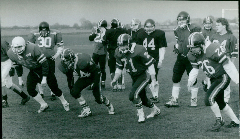 The Carterton Wildcats American Football team in training. - Vintage Photograph