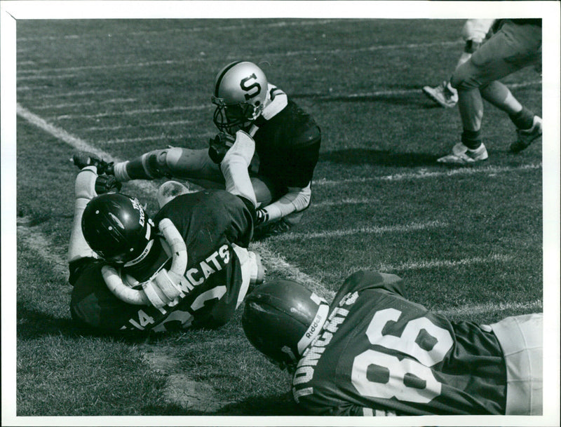 American football player Jrdon Love in action. - Vintage Photograph