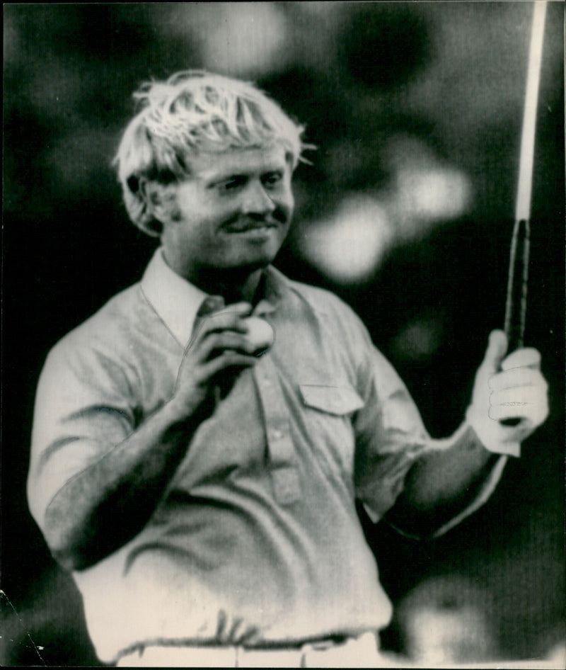A young Jack Nicklaus poses with a golf club at a tournament in Pittsburgh, PA. - Vintage Photograph