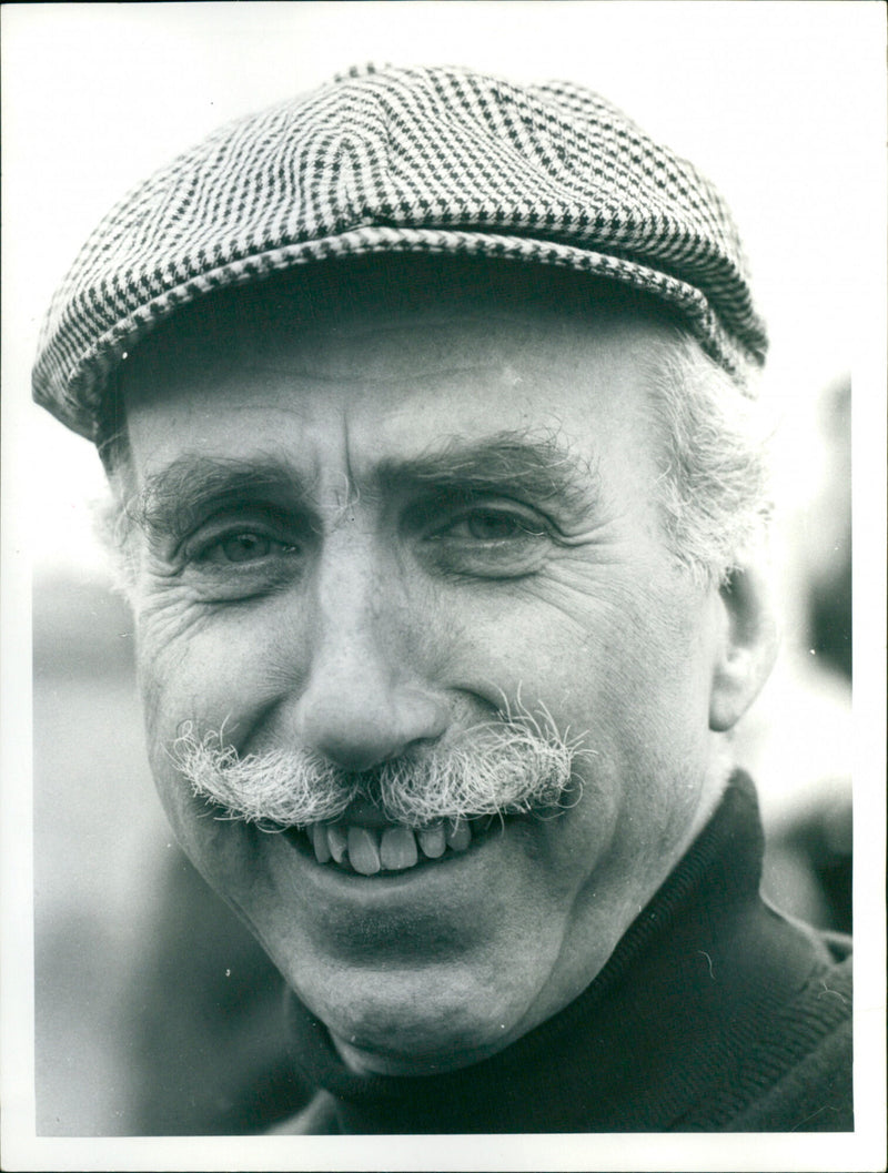 Producer Barney Colehan on the set of a film in 1973. - Vintage Photograph