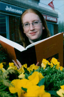 Sarah Collett takes a break to read and write poetry. - Vintage Photograph