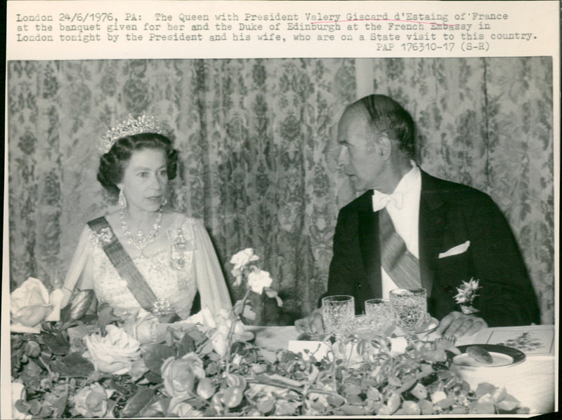 Queen Elizabeth II and President Valery Giscard d'Estaing of France at a State Banquet in London. - Vintage Photograph