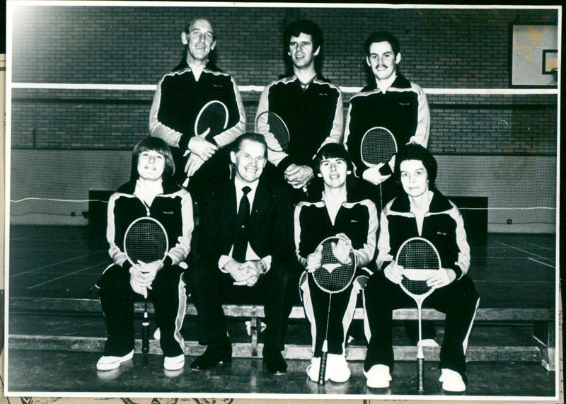 Abingdon ManuLife's badminton team show off their new tracksuits to ManuLife underwriter Peter Cattell. - Vintage Photograph