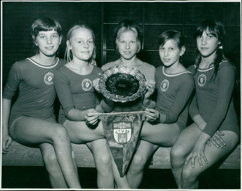 Oxford gymnasts celebrate winning the silver salver at the Godesberger Turnverein 1888 Ev competition in Bonn, Germany. - Vintage Photograph