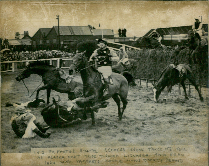 A horse and rider traverse a rugged landscape in Alaska. - Vintage Photograph