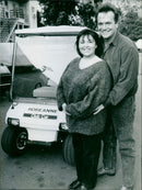 Roseanne Barr and Tom Arnold in a scene from "Roseanne Club Car" on BBC Television. - Vintage Photograph