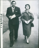 Cricket player Raman Subba Row and his fiancée, Anne Harrison, walking in London. - Vintage Photograph