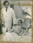 South African Surgeon Christian Barnard examines Paolo Flocca a boy from south Rome - Vintage Photograph