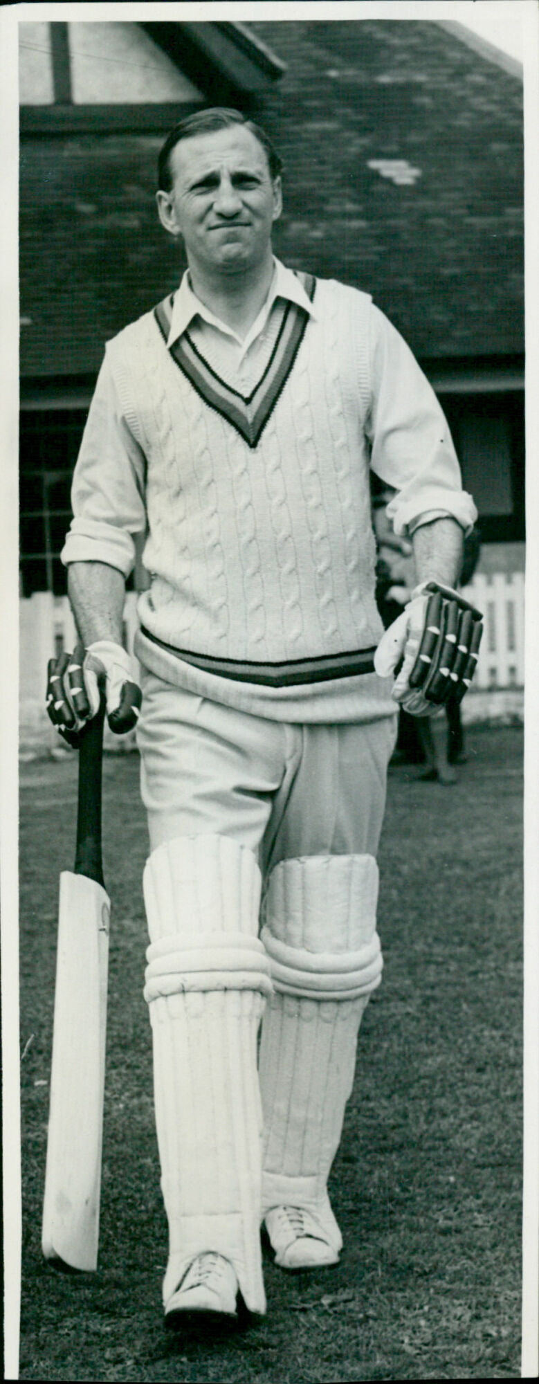 Sir Len Hutton, a former English cricketer, poses for a photograph.