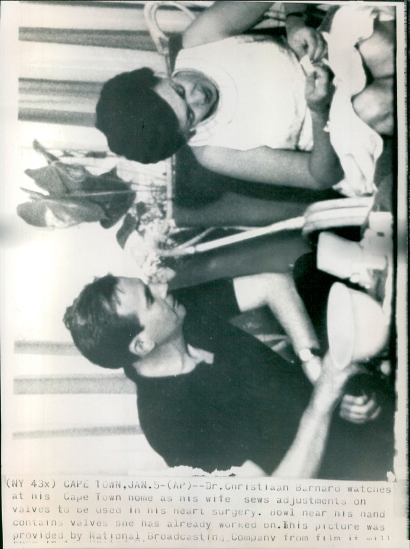 Christian Barnard with wife sewing valves to be used in his heart surgery in Cape town - Vintage Photograph