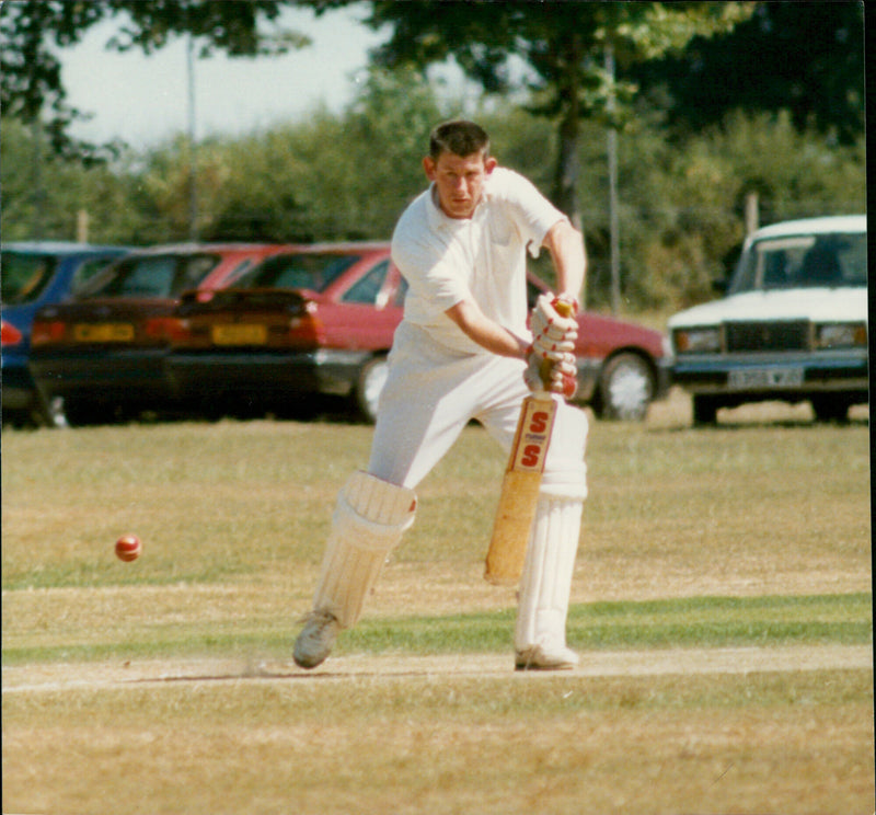 Steve Wheeler captures Paul Hemming in a cricket match. - Vintage Photograph