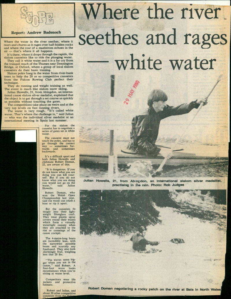 Julian Howells and Robert Doman, international slalom canoeists, practice white water canoeing in the rain. - Vintage Photograph