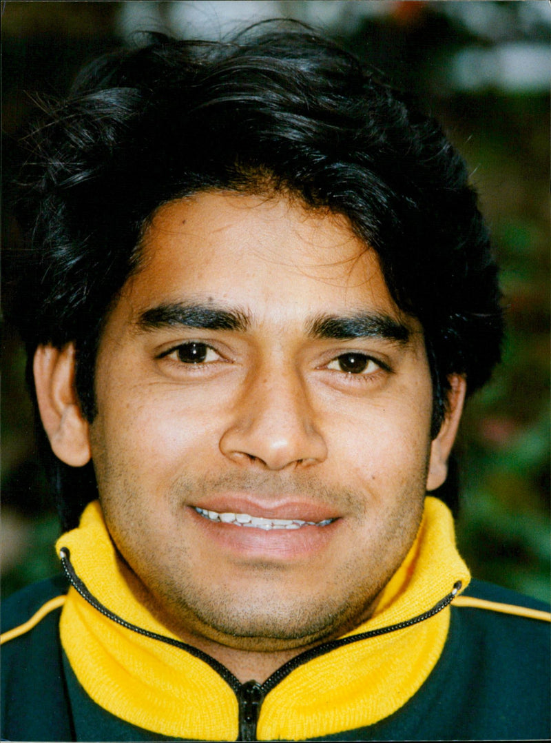 Cricketer Aqib Javed poses for a photograph. - Vintage Photograph