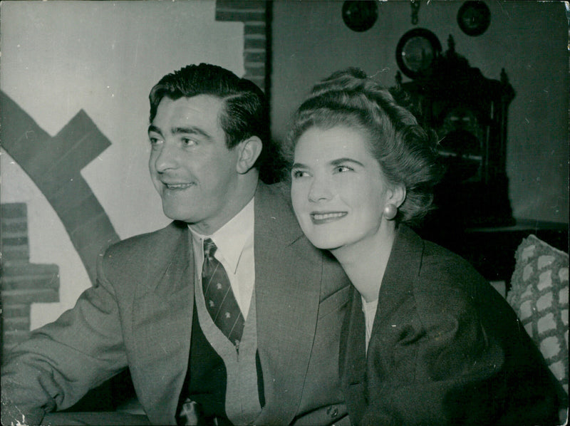 English cricketer Freddie Truman and his fiancée Enid Chapman enjoy a quiet evening together before their upcoming wedding. - Vintage Photograph