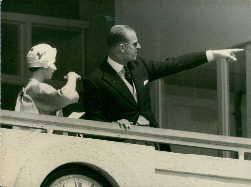 prince Philip, duke of Edinburgh points out something of interest to princess Margaret - Vintage Photograph