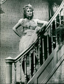 Actress Faye Dunaway finds solace in a house of ill repute in the movie "Little Big Man". - Vintage Photograph