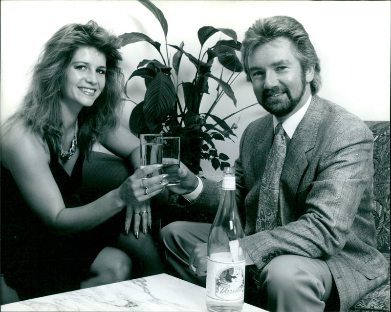 British television presenter Noel Edmonds and his wife, Helen, pose for a photograph. - Vintage Photograph