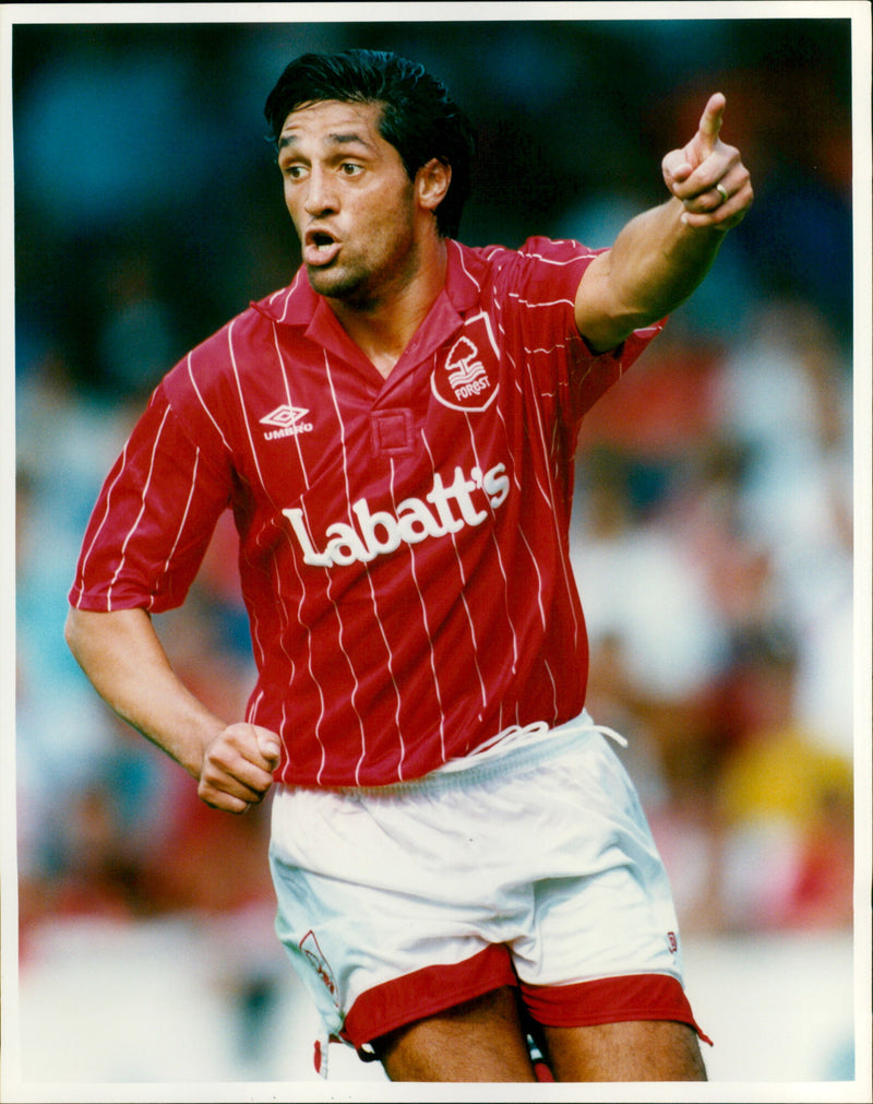 Notts Forest F.C. player Robert Rosario wearing an Umbro O Forest Labatt's ASP jersey. - Vintage Photograph