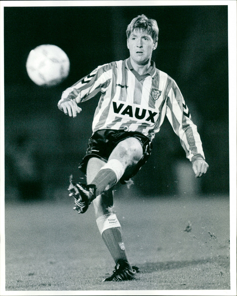 Anton Rogan of Sunderland competes in a match. - Vintage Photograph