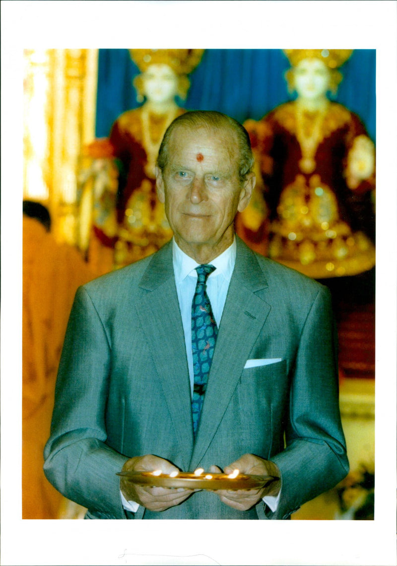 Prince Philip, Duke of Edinburgh, the largest public park in Scotland, is seen in the background of a sunny spring day. - Vintage Photograph