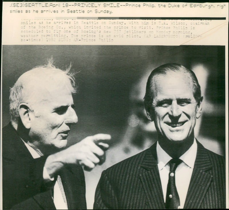 Prince Philip, the Duke of Edinburgh, arrives with a smile in Seattle. - Vintage Photograph