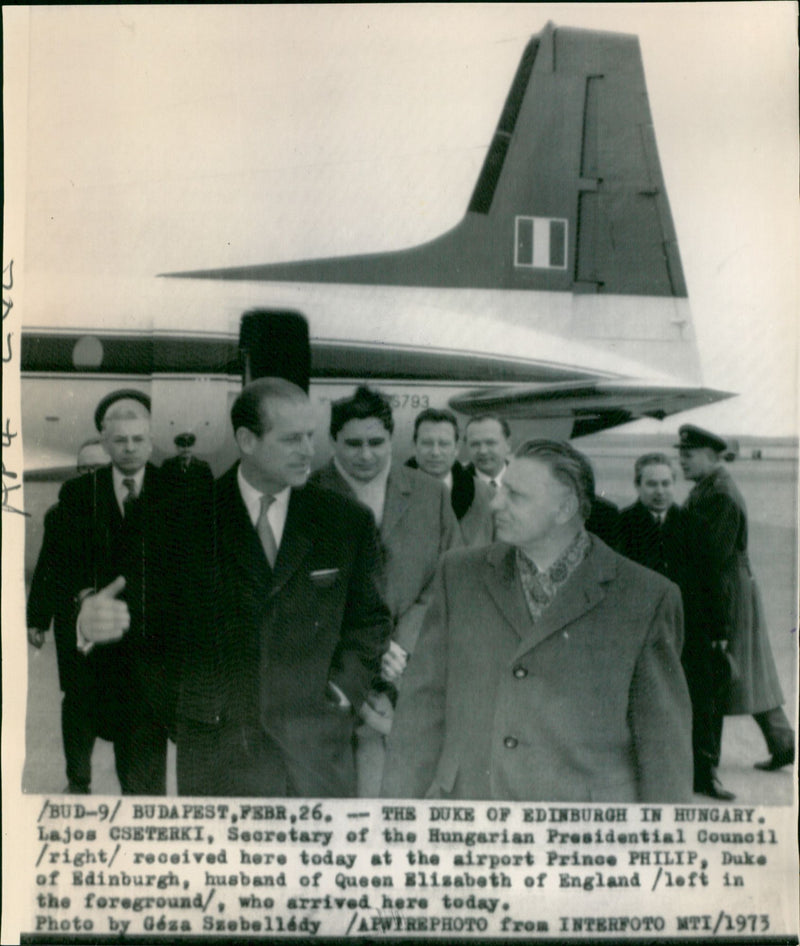 Prince Philip, Duke of Edinburgh, is welcomed by Lajos Cseterki, Secretary of the Hungarian Presidential Council, upon arrival in Budapest on 2021-02-26. - Vintage Photograph