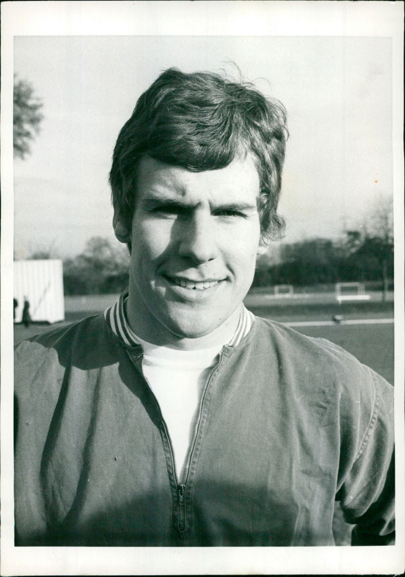 Everton's Joe Royle is in doubt for England's upcoming match against Wales due to fitness concerns. - Vintage Photograph
