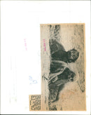 Graham Chapman and the Hermit in a scene from the film Life of Brian. - Vintage Photograph