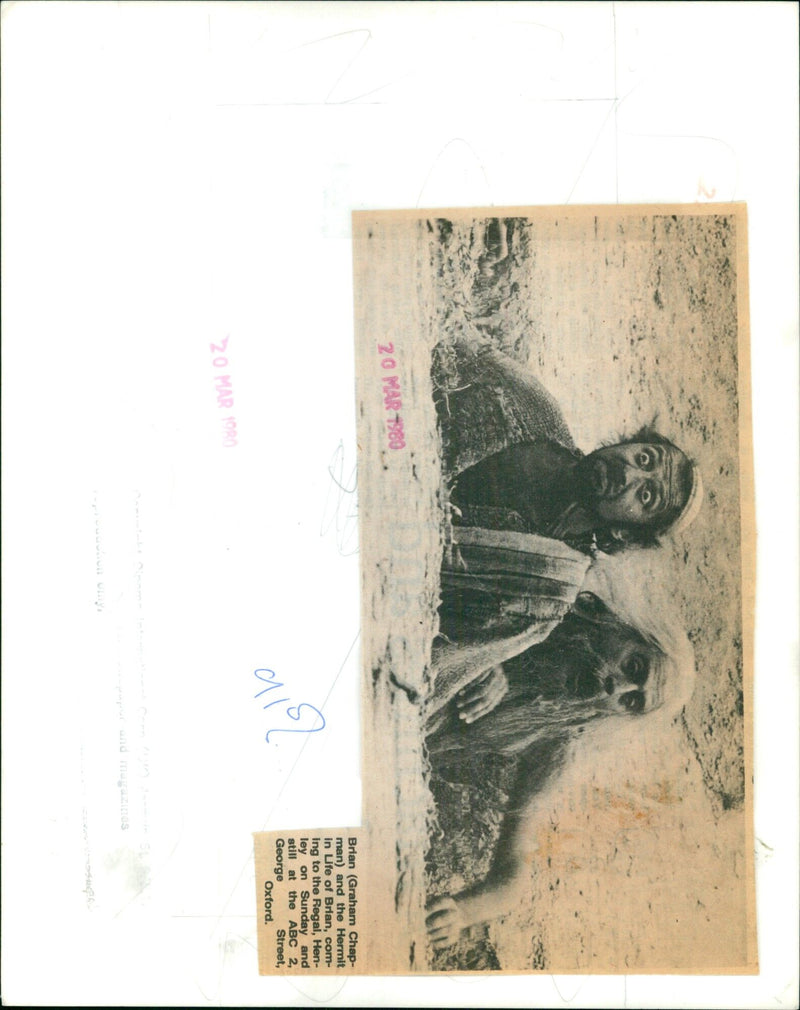 Graham Chapman and the Hermit in a scene from the film Life of Brian. - Vintage Photograph