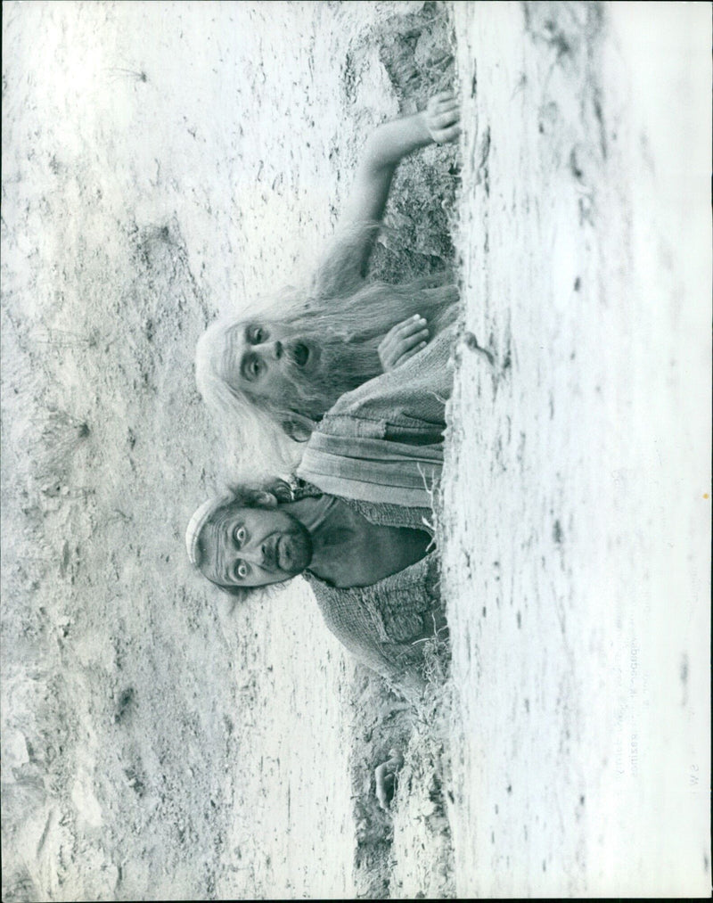 Graham Chapman and the Hermit in a scene from the film Life of Brian. - Vintage Photograph