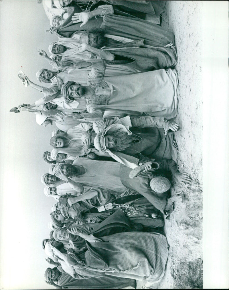Cast of Monty Python's Life of Brian attend a film premiere in London on January 22, 1990. - Vintage Photograph