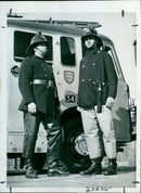 Members of the United States military conducting a training exercise with tanks. - Vintage Photograph