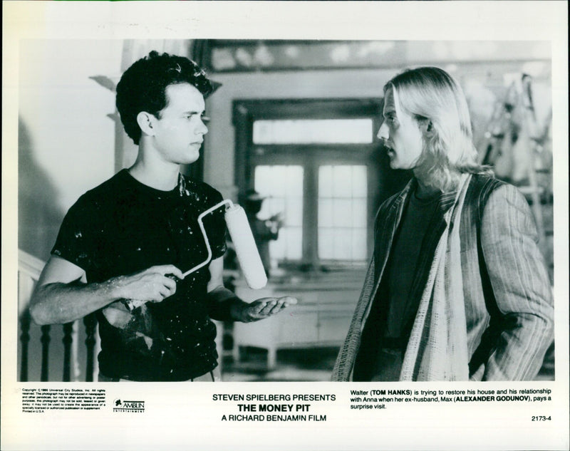 Tom Hanks and Alexander Godunov in a scene from the film The Money Pit. - Vintage Photograph