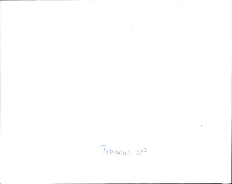 Tom Hanks and Daryl Hannah embrace in a romantic scene from the 1984 movie "Splash". - Vintage Photograph