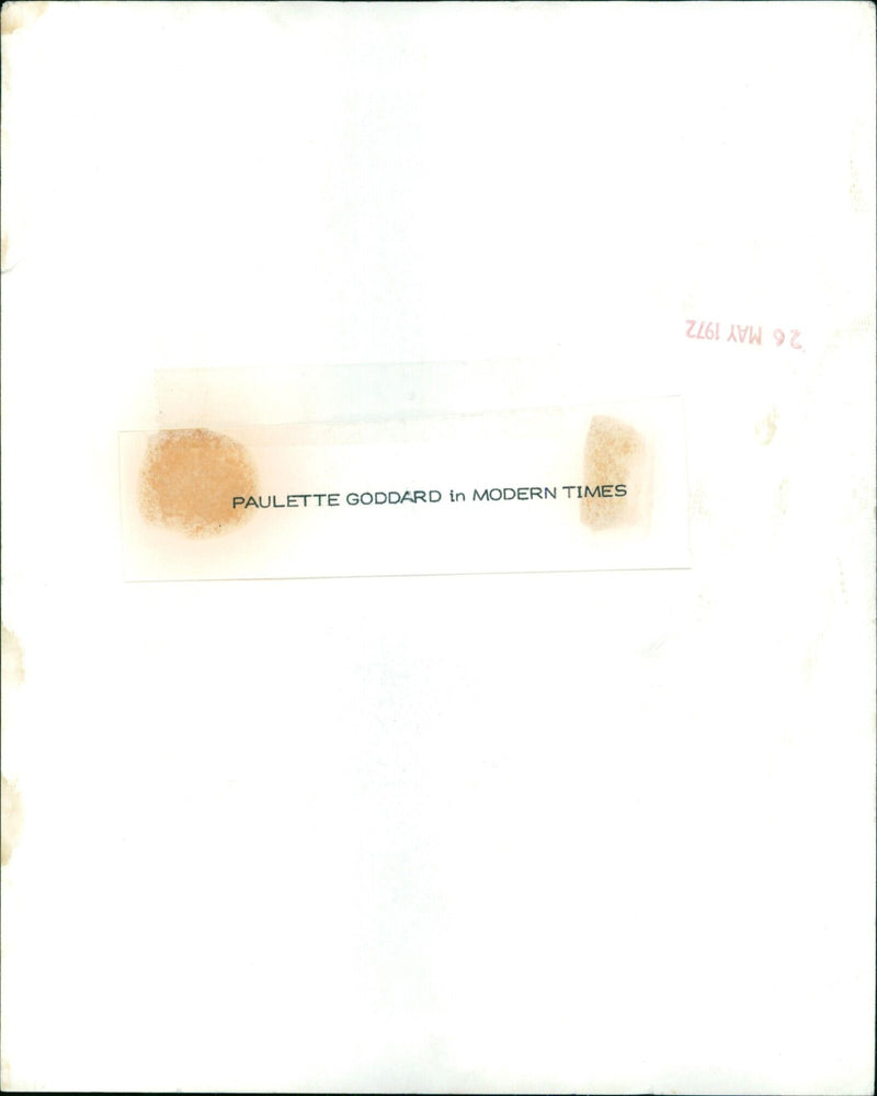 Actress Paulette Goddard poses in a scene from the 1936 film "Modern Times". - Vintage Photograph