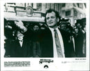Bill Murray stars as Frank Cross in the Paramount Pictures film "Scrooged". - Vintage Photograph
