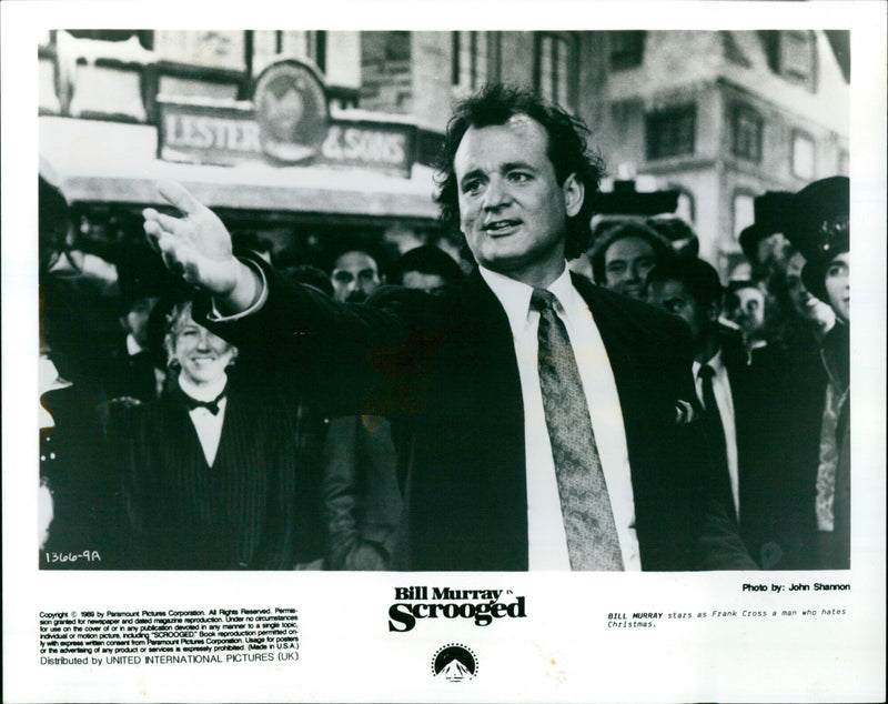 Bill Murray stars as Frank Cross in the Paramount Pictures film "Scrooged". - Vintage Photograph