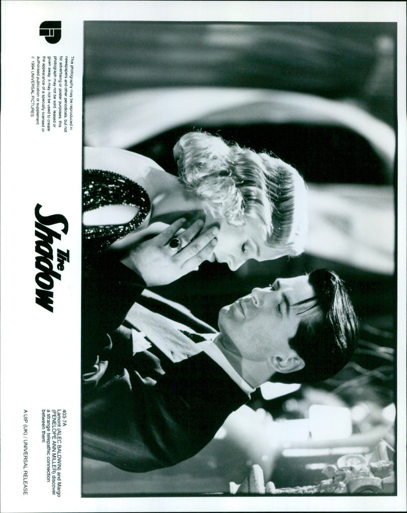 Lamont (ALEC BALDWIN) and Margo (PENELOPE ANN MILLER) discover a strange telepathic connection in the film "Shadow". - Vintage Photograph